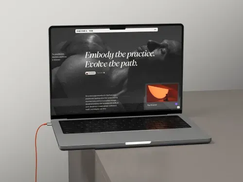 The Become A Yogi homepage on a laptop