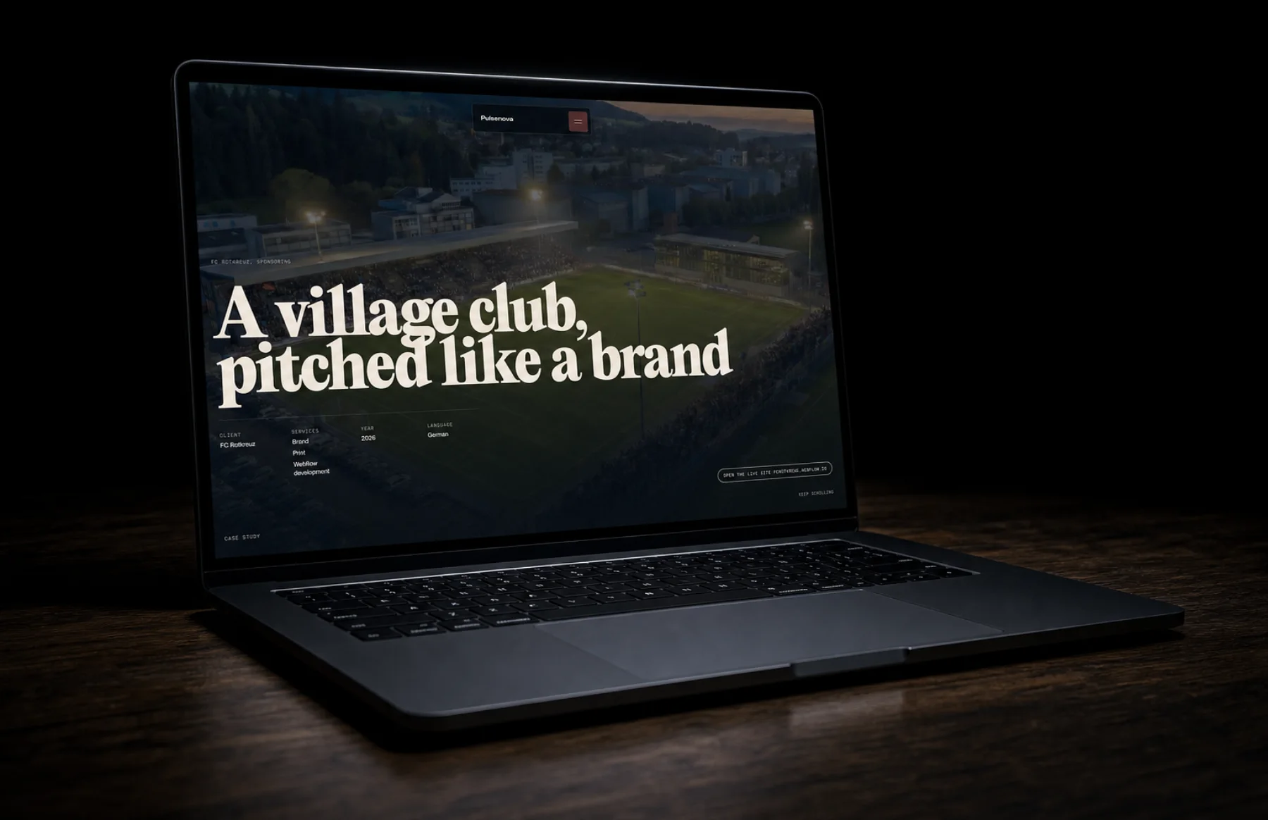 A laptop in a dark room showing the FC Rotkreuz site, headline A village club, pitched like a brand